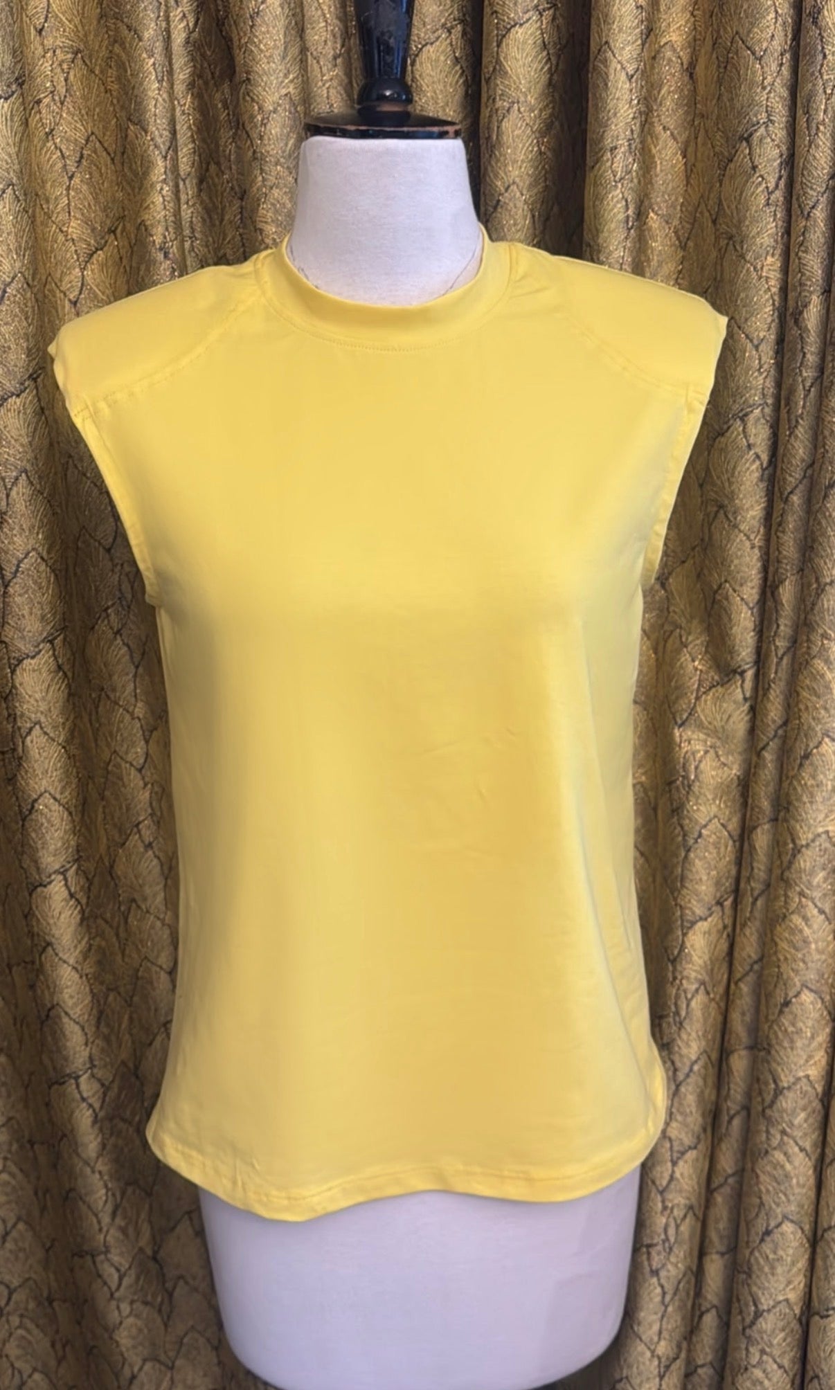 The Alaia Shoulder Pad Top