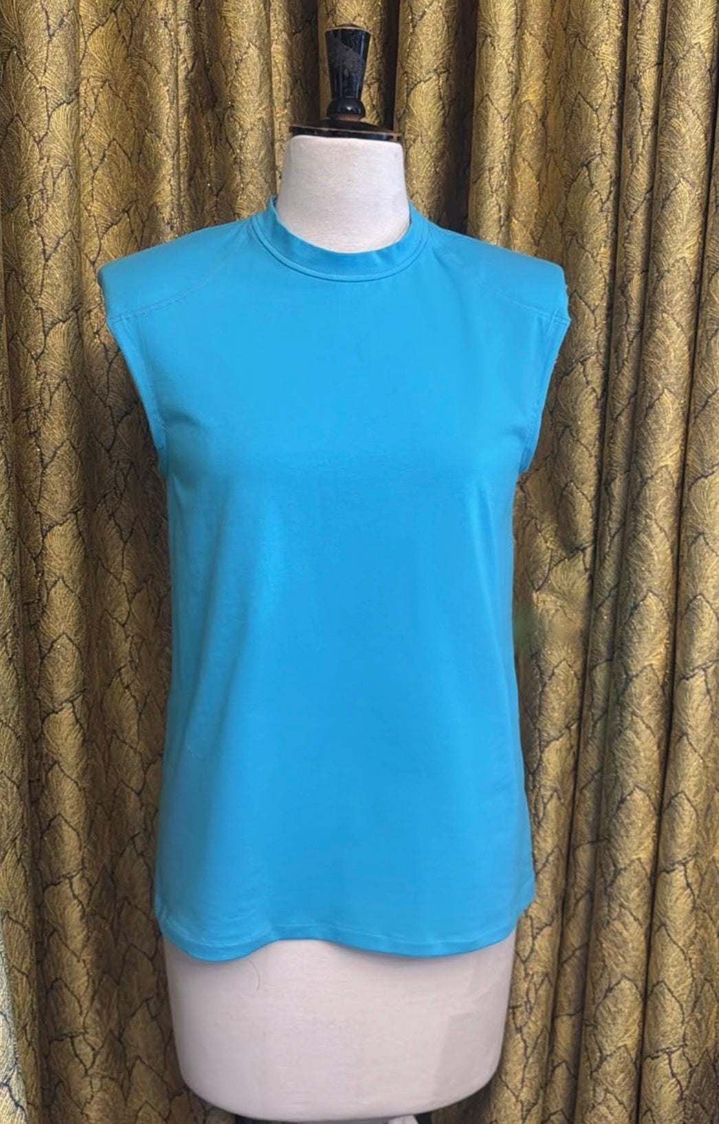 The Alaia Shoulder Pad Top