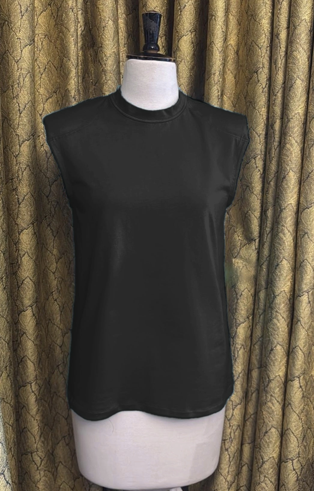 The Alaia Shoulder Pad Top