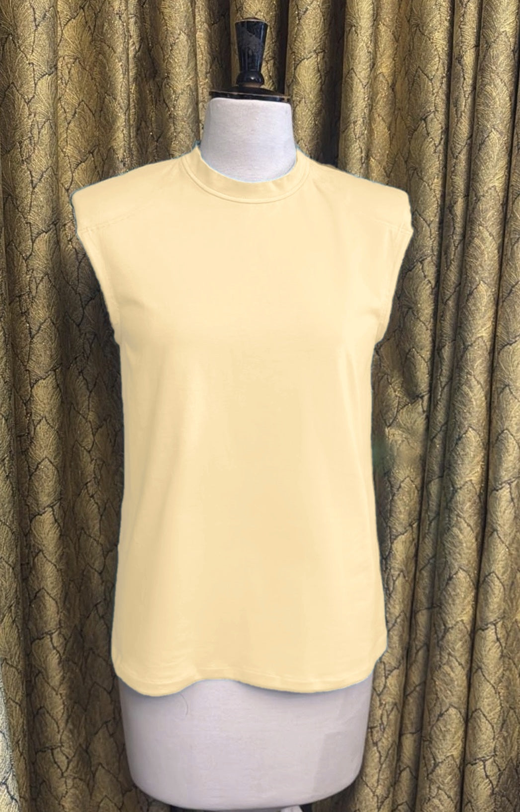 The Alaia Shoulder Pad Top