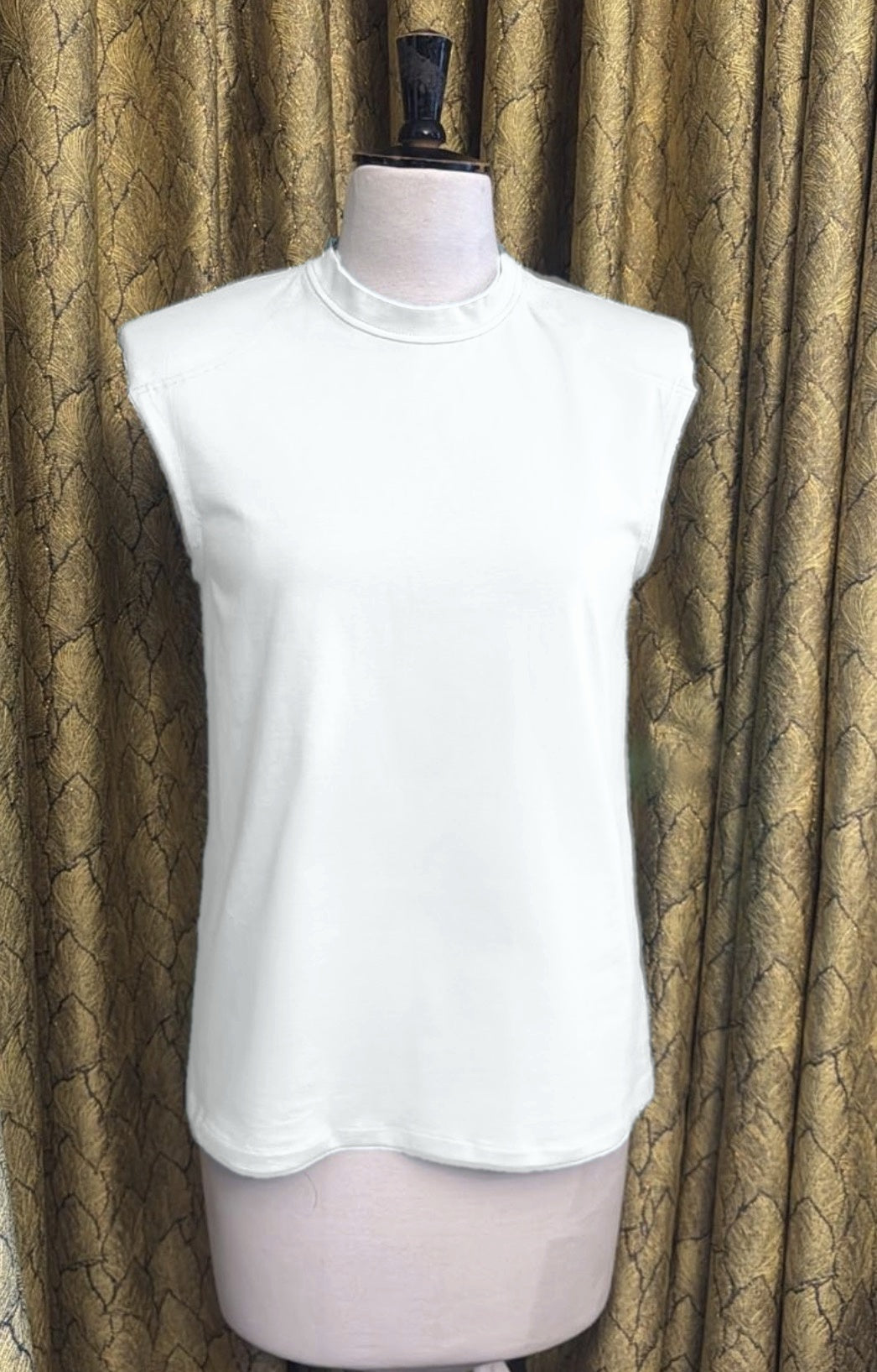 The Alaia Shoulder Pad Top